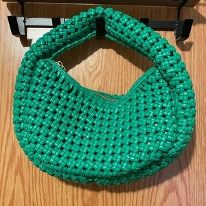 Green knotted purse